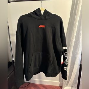 Formula 1 hoodie, new with tags! Very soft and comfy and has all the F1 logos.